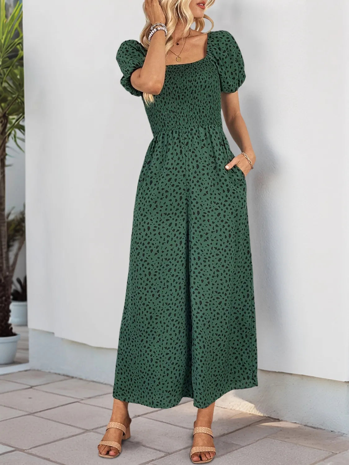 Printed Square Neck Puff Sleeve Jumpsuit with Smocked Detail and Pockets.