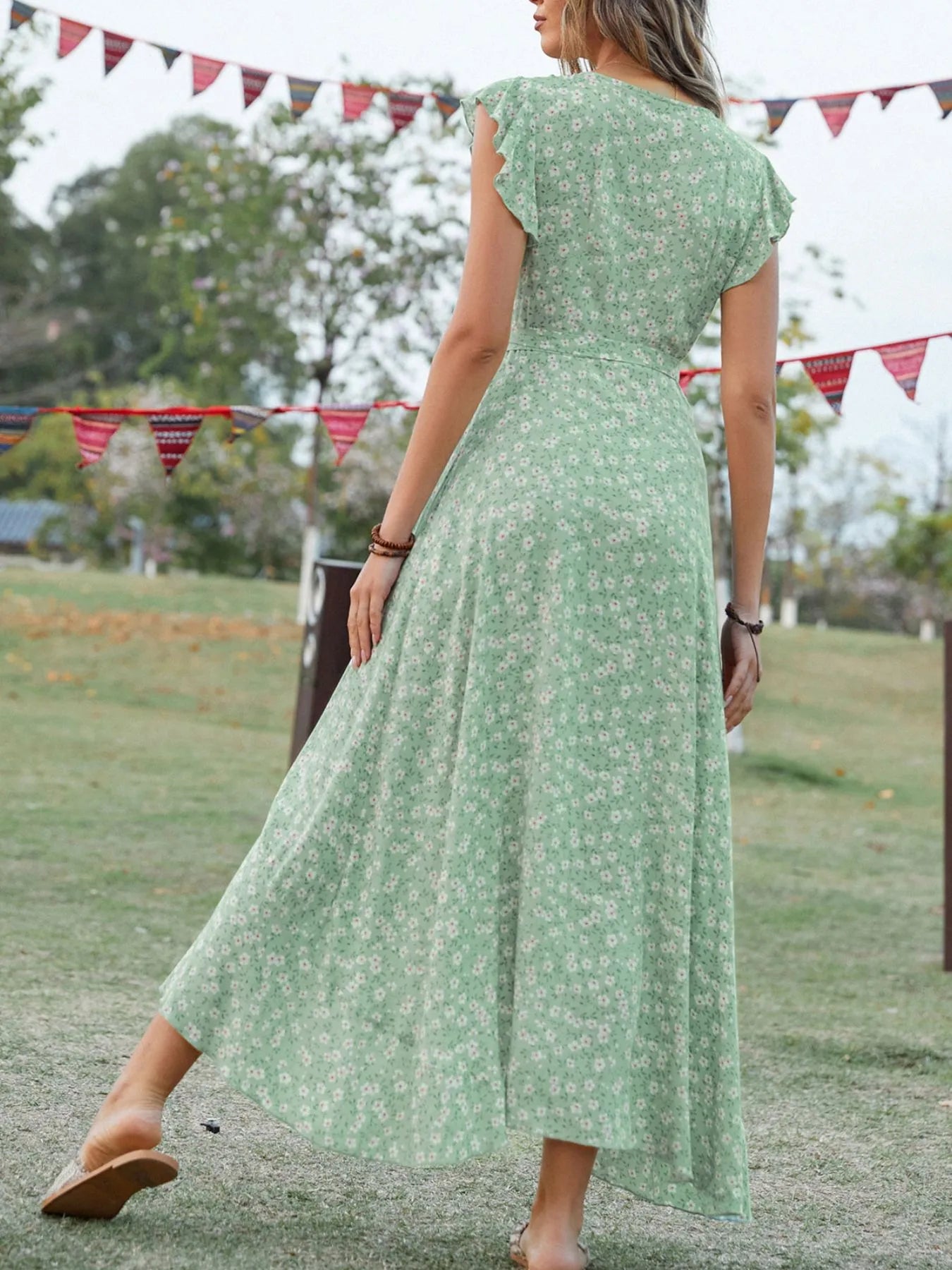 Printed Surplice Ruffle Sleeve Dress.