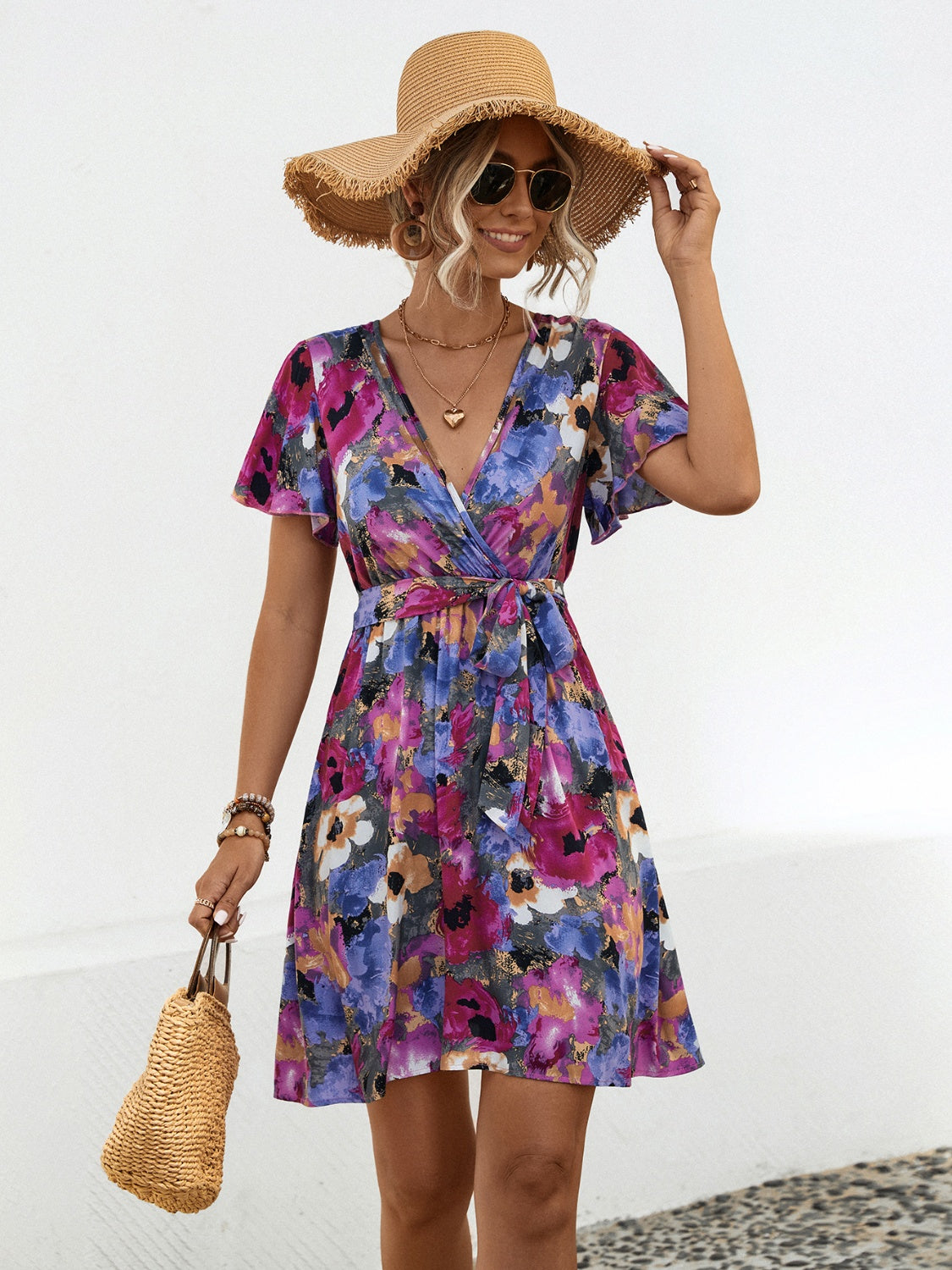 Printed Surplice Tie Waist Mini Dress.