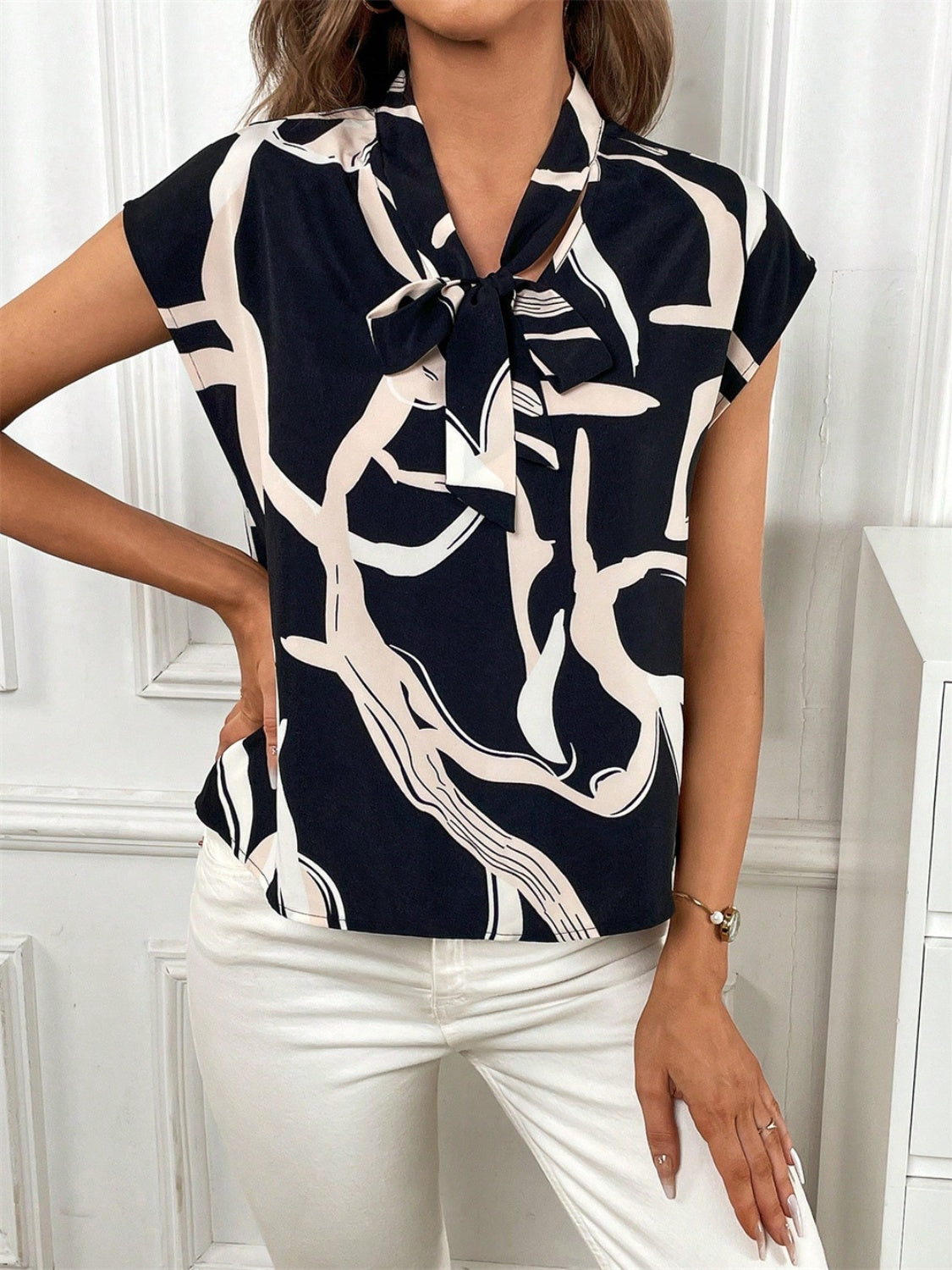 Printed Tie Neck Cap Sleeve Blouse with Tied.