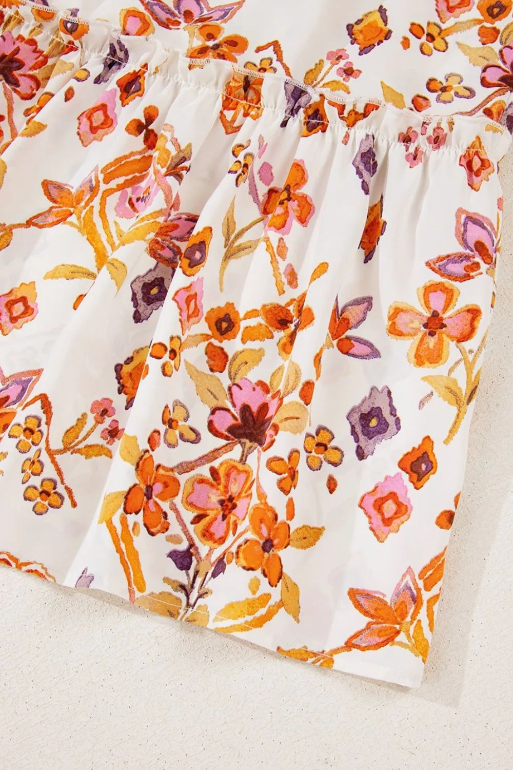 Printed Tie Neck Cap Sleeve Mini Dress.