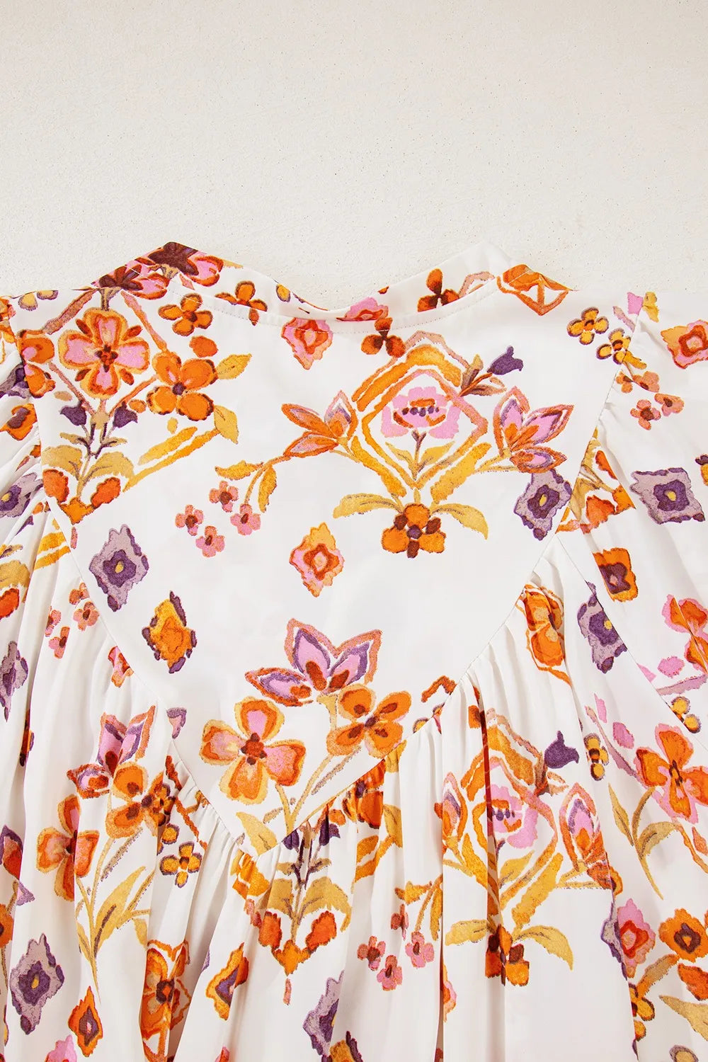 Printed Tie Neck Cap Sleeve Mini Dress.
