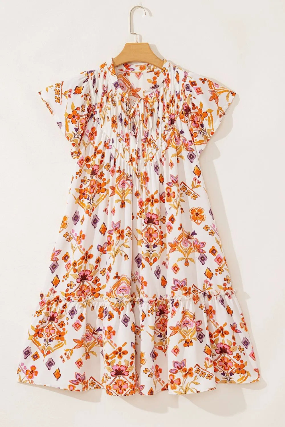 Printed Tie Neck Cap Sleeve Mini Dress.