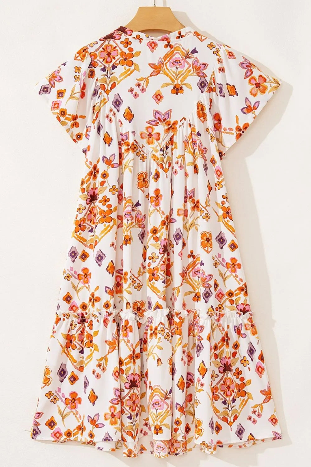 Printed Tie Neck Cap Sleeve Mini Dress.