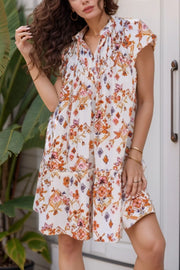 Printed Tie Neck Cap Sleeve Mini Dress.