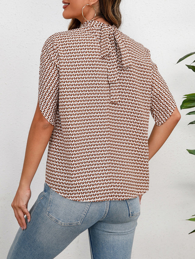 Printed Tie Neck Half Sleeve Blouse.