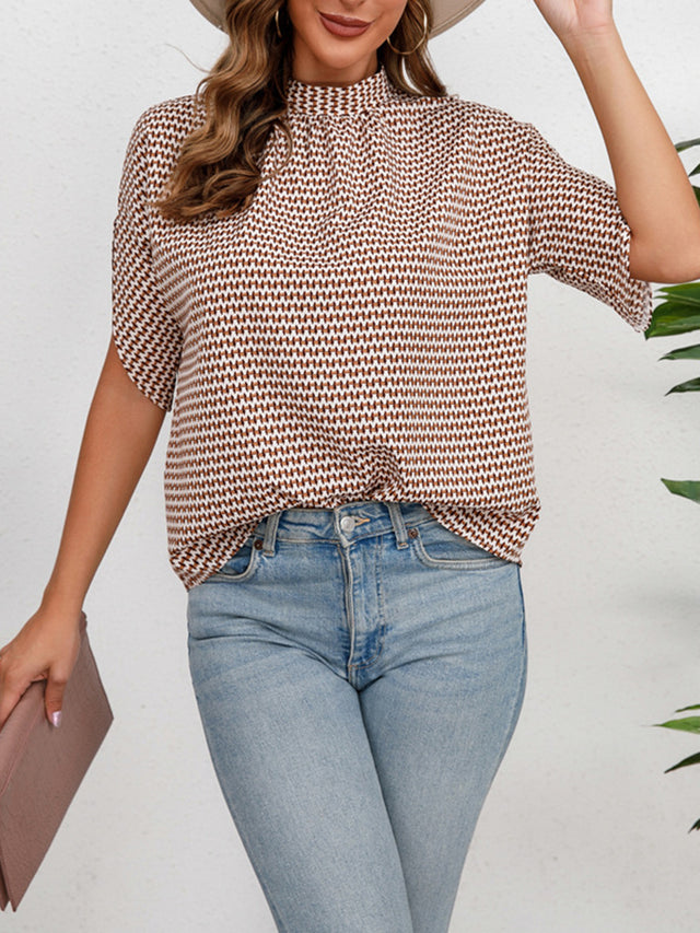 Printed Tie Neck Half Sleeve Blouse.