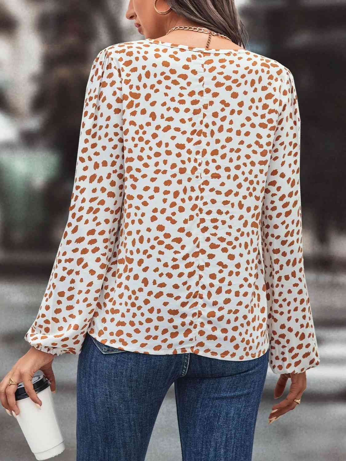 Printed Tie Neck Long Sleeve Blouse.