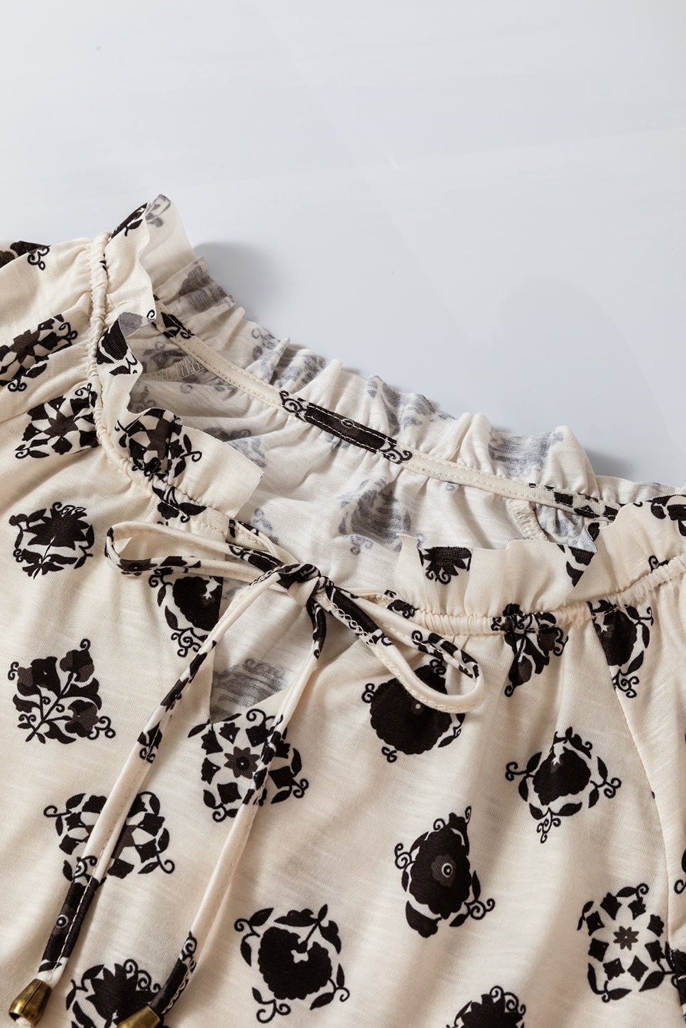Printed Tie Neck Long Sleeve Blouse.