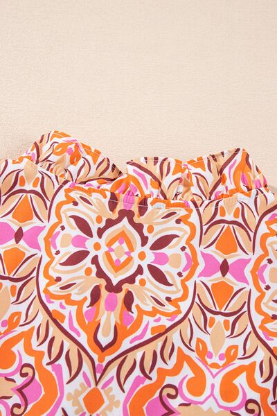 Printed Tie Neck Long Sleeve Mini Dress.