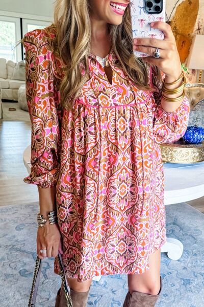 Printed Tie Neck Long Sleeve Mini Dress.
