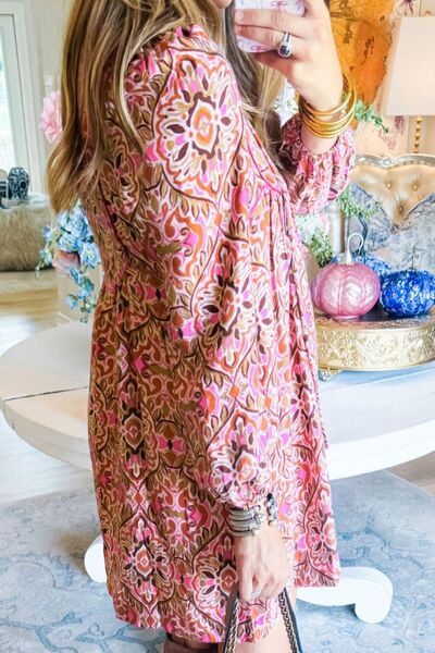 Printed Tie Neck Long Sleeve Mini Dress.