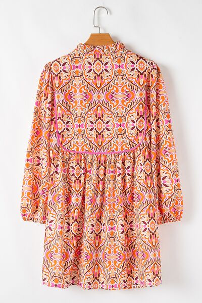 Printed Tie Neck Long Sleeve Mini Dress.