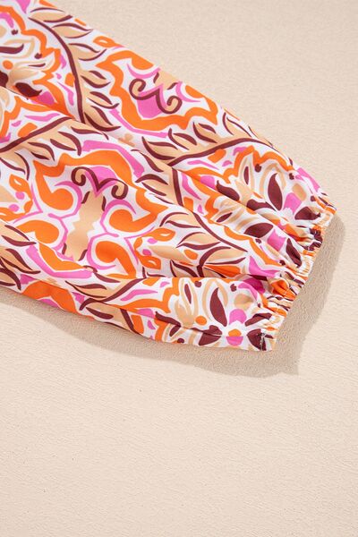 Printed Tie Neck Long Sleeve Mini Dress.