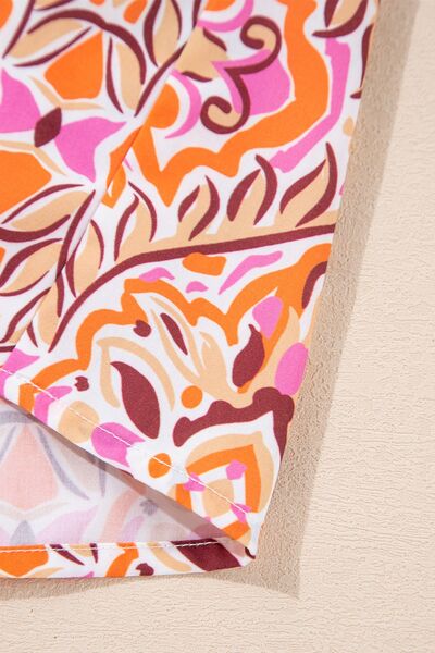 Printed Tie Neck Long Sleeve Mini Dress.