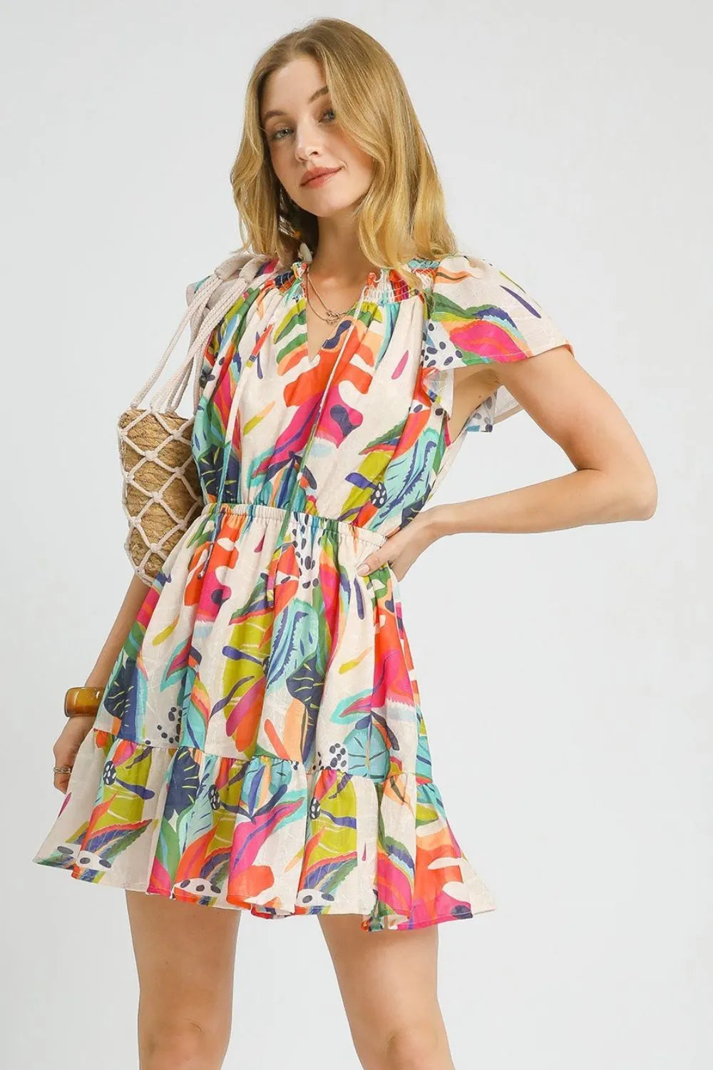 Umgee Printed Tie Neck Ruffled Hem Dress.