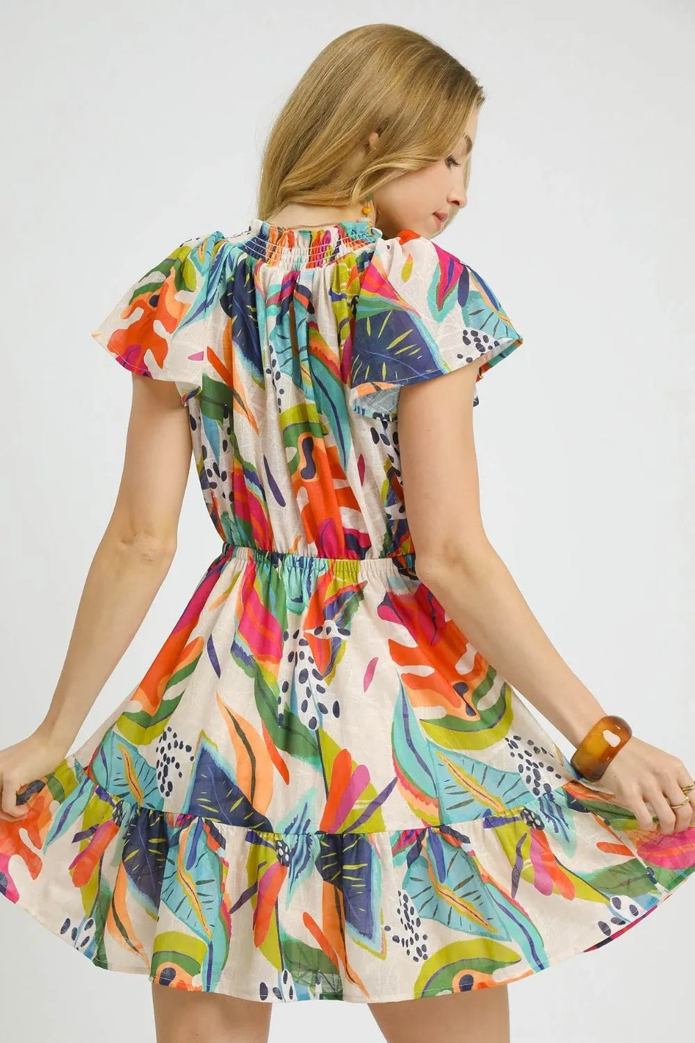 Umgee Printed Tie Neck Ruffled Hem Dress.