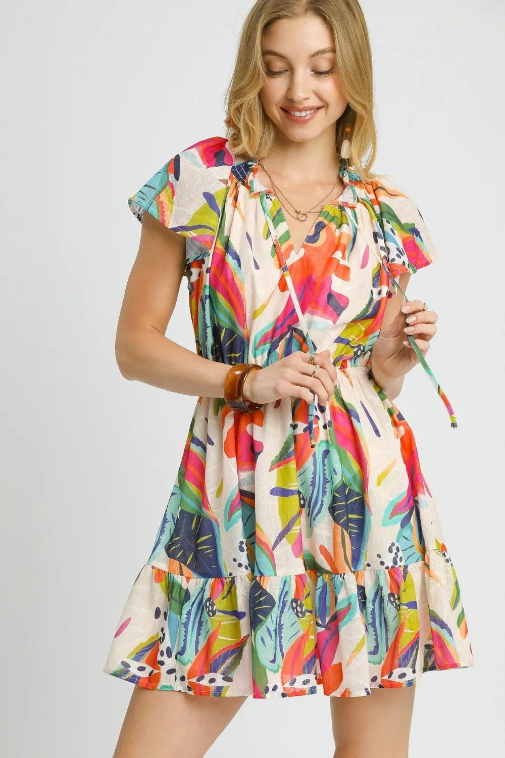 Umgee Printed Tie Neck Ruffled Hem Dress.