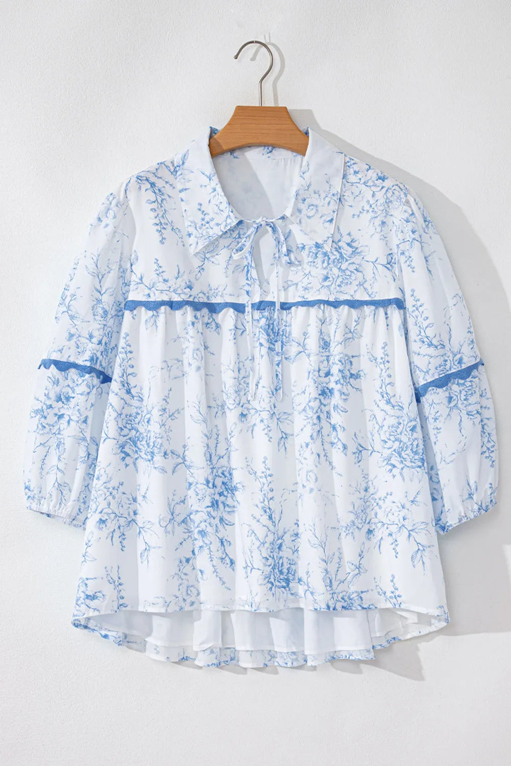 Printed Tie Neck Three-Quarter Sleeve Blouse.