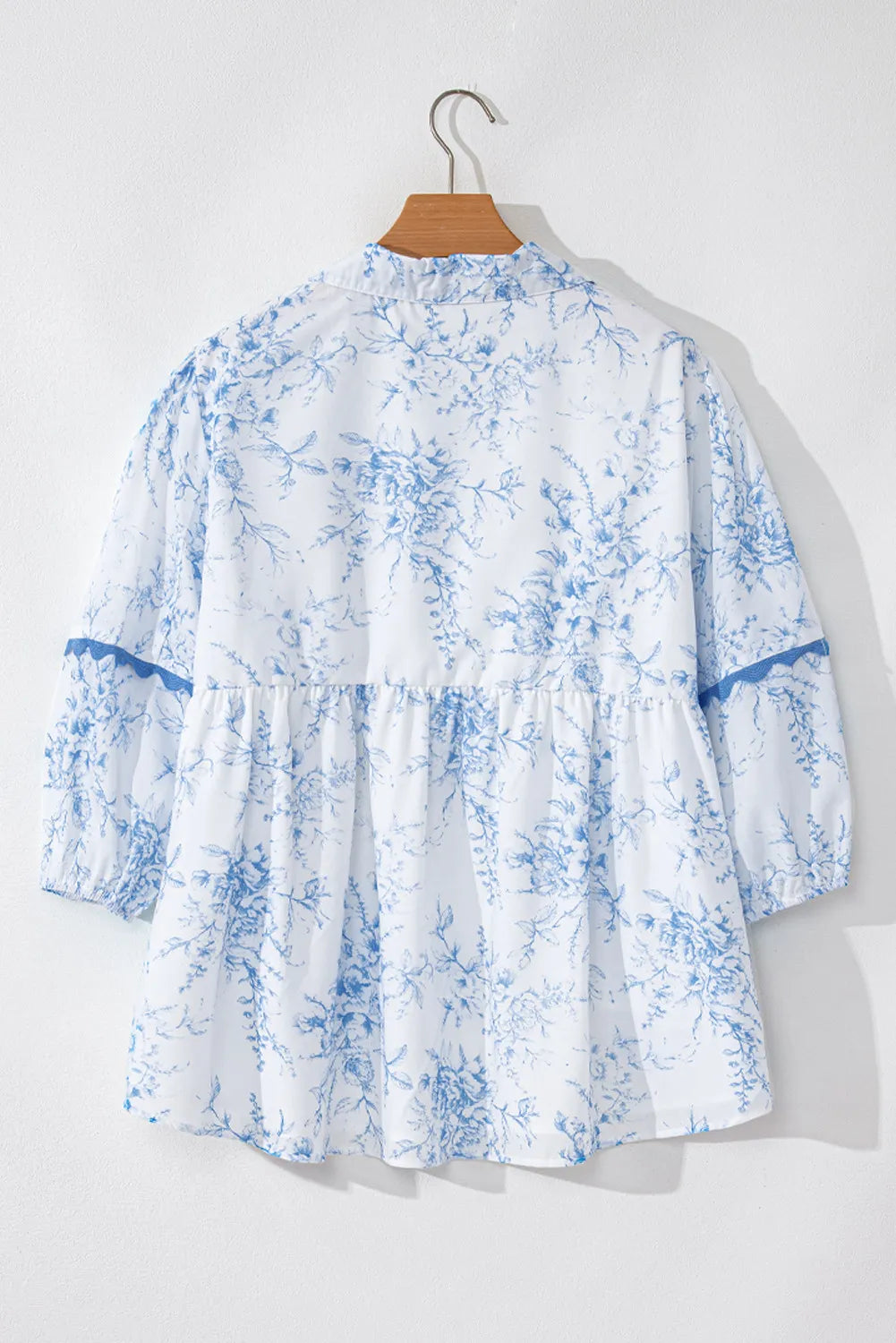 Printed Tie Neck Three-Quarter Sleeve Blouse.