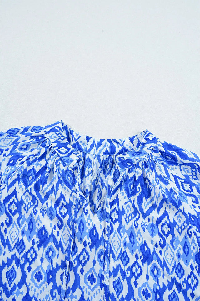Printed Tie Neck Three-Quarter Sleeve Blouse with Tied.