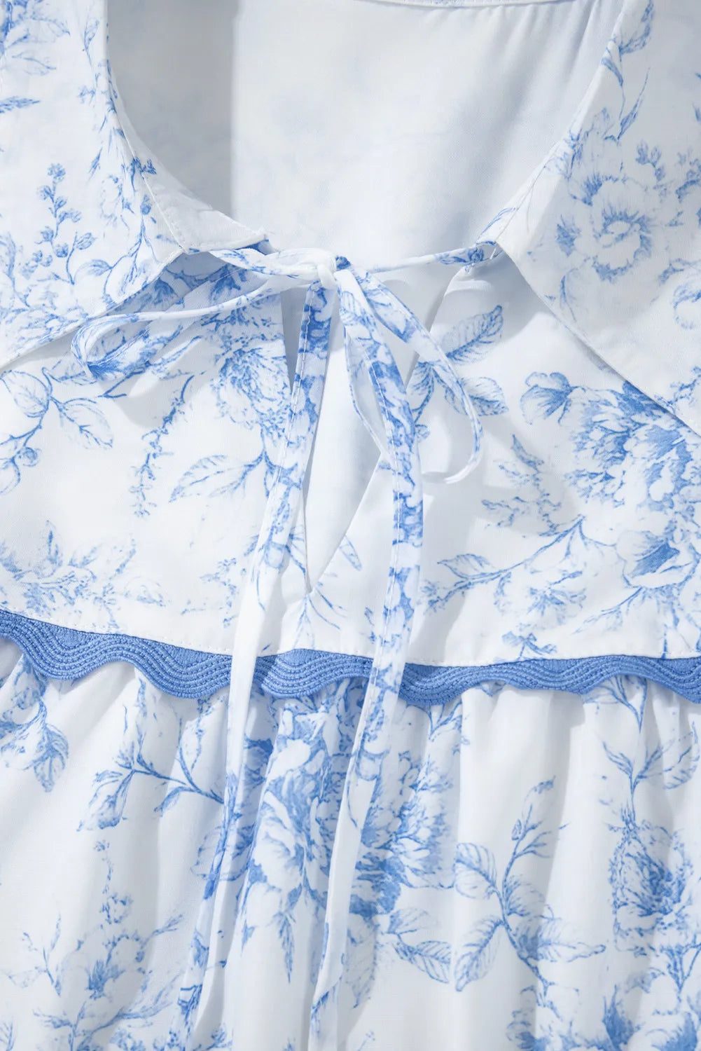 Printed Tie Neck Three-Quarter Sleeve Blouse.