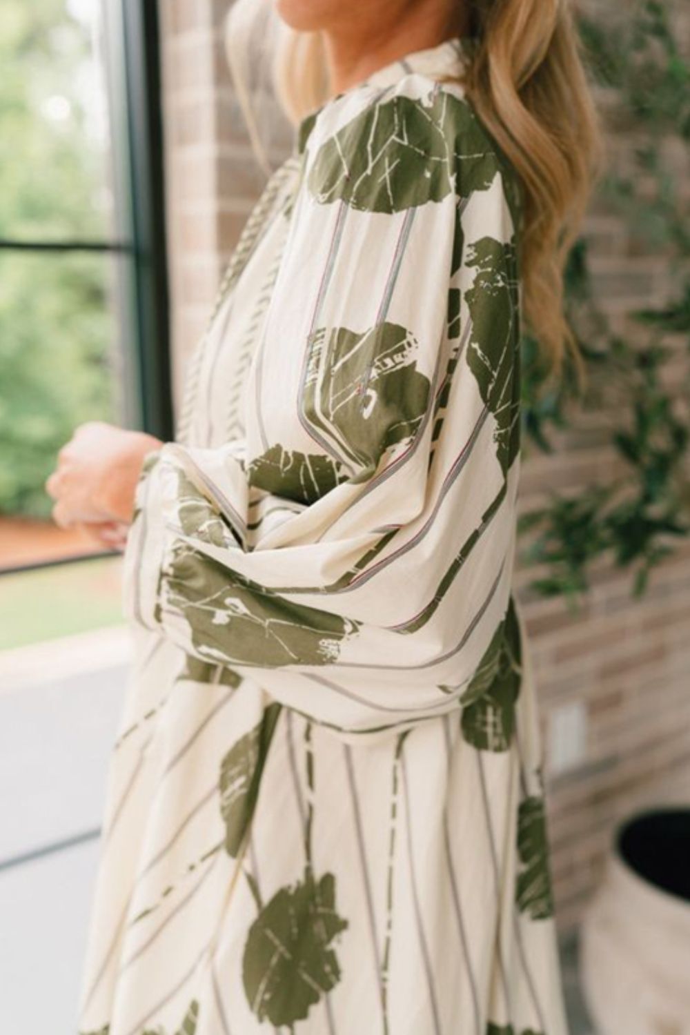 Printed Tie Neck Three-Quarter Sleeve Mini Dress.