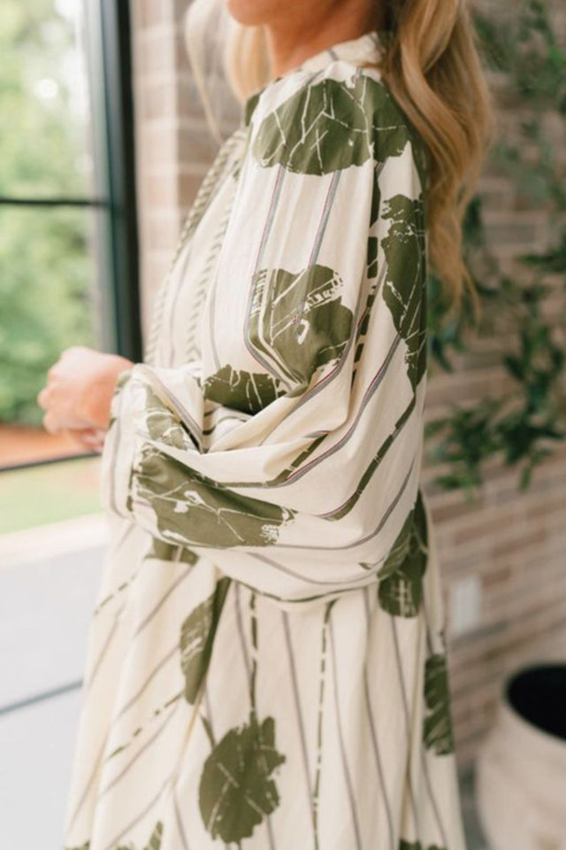 Printed Tie Neck Three-Quarter Sleeve Mini Dress.