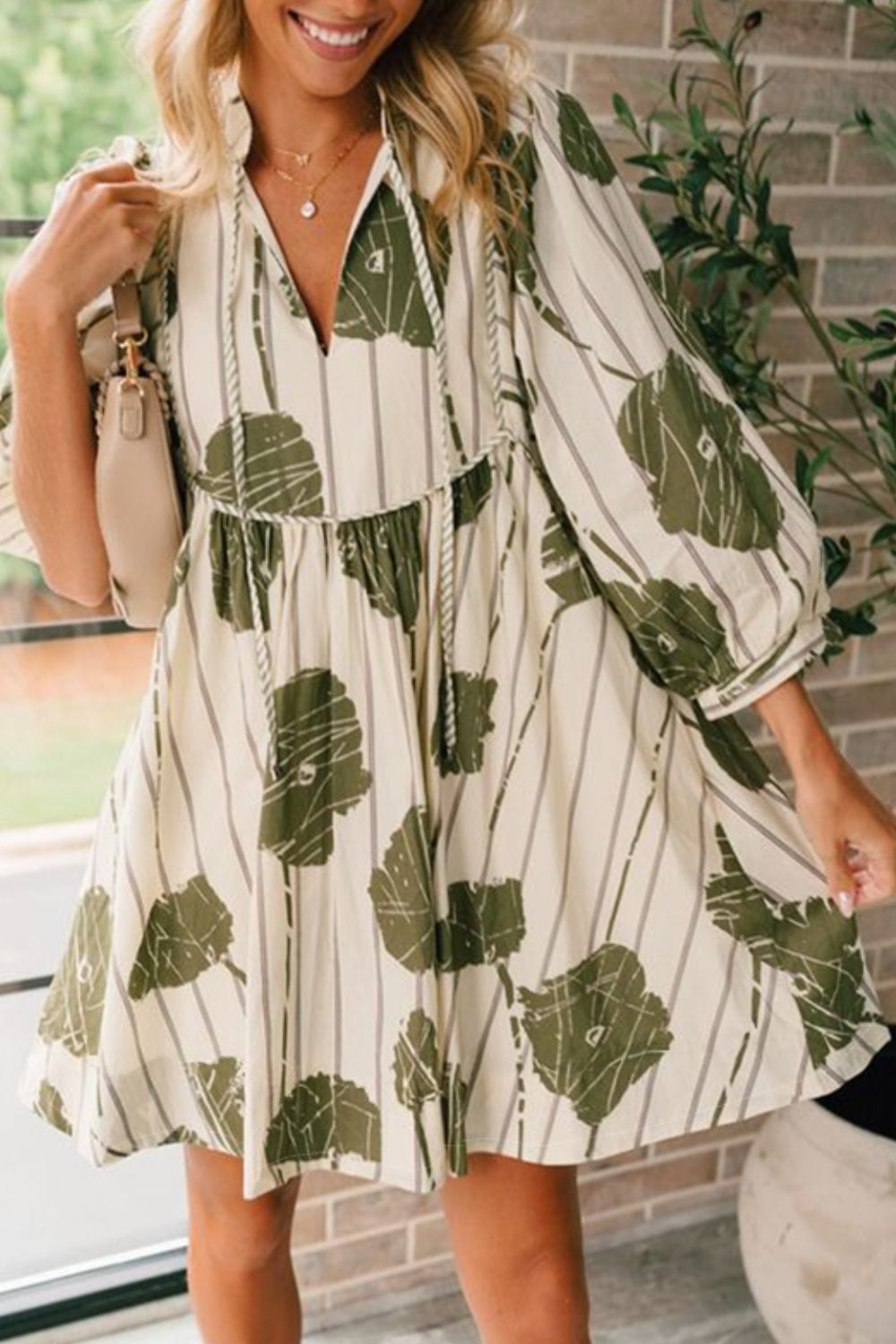 Printed Tie Neck Three-Quarter Sleeve Mini Dress.