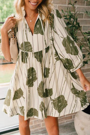 Printed Tie Neck Three-Quarter Sleeve Mini Dress.
