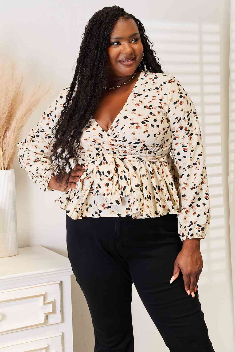 Honey Printed Tied Plunge Peplum Blouse.