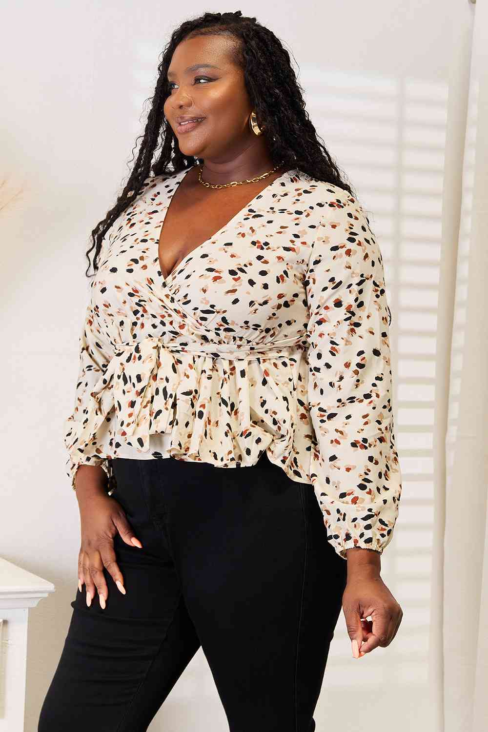 Honey Printed Tied Plunge Peplum Blouse.