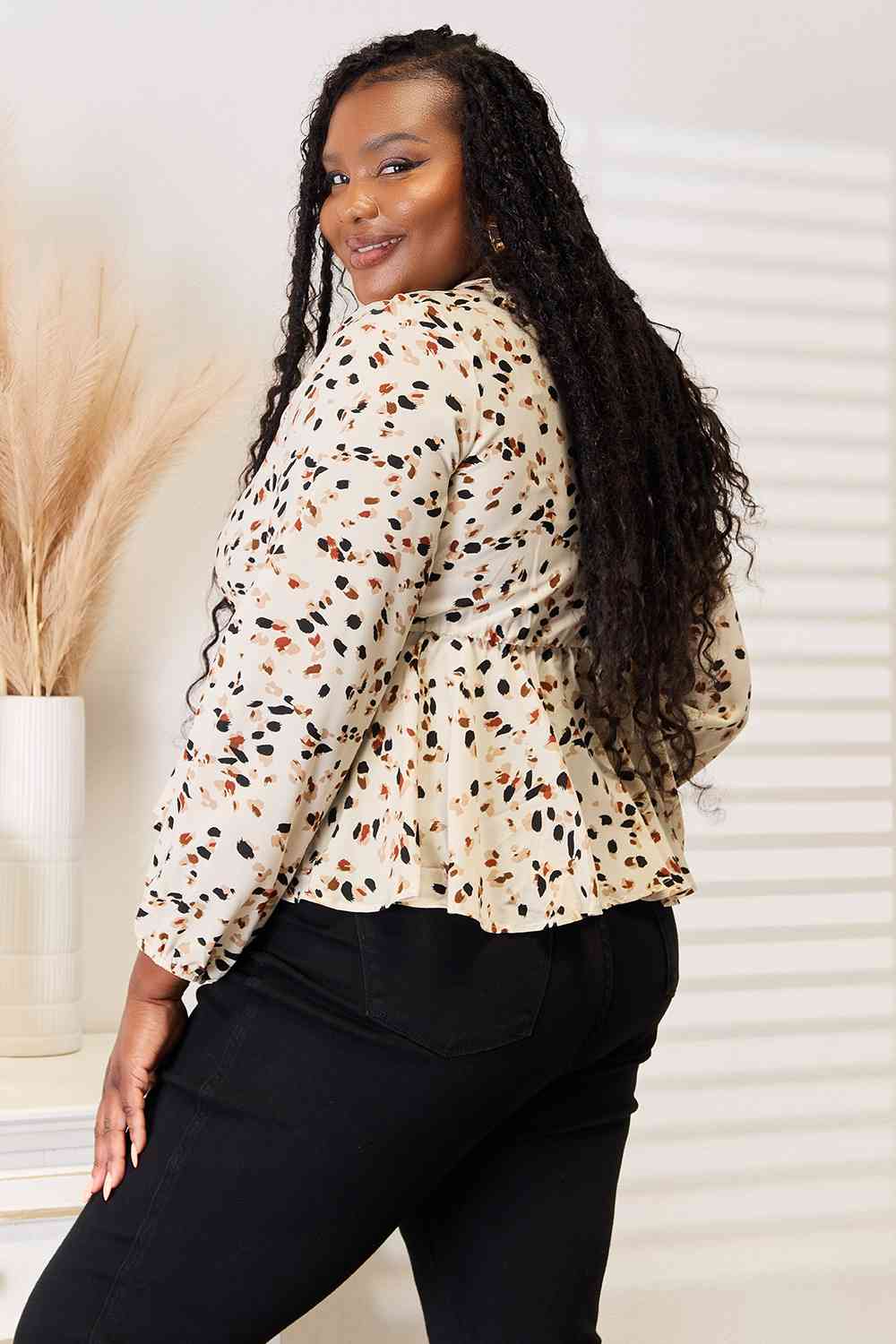 Honey Printed Tied Plunge Peplum Blouse.