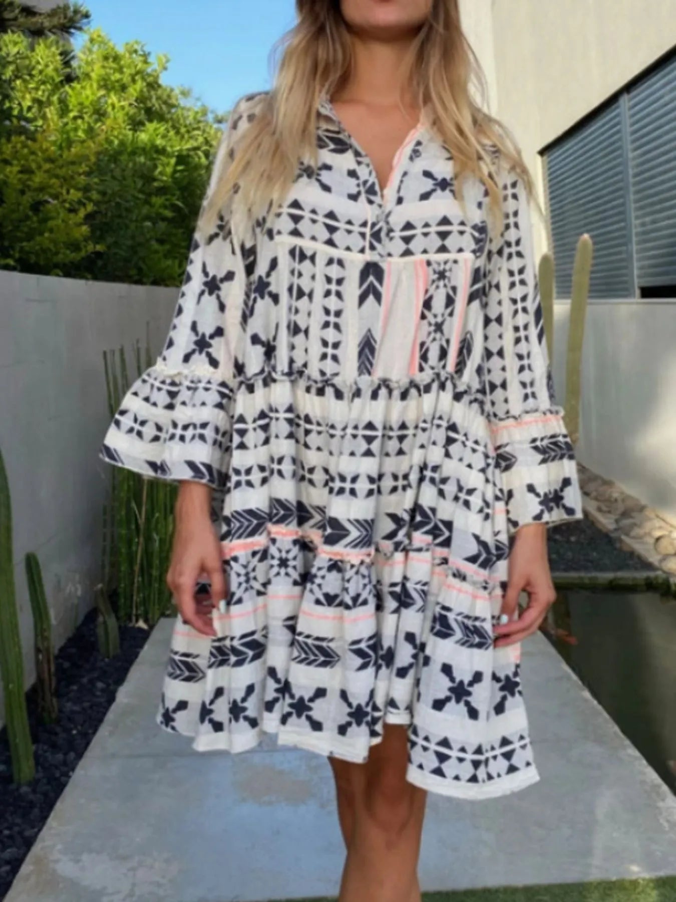 Printed Tiered Babydoll Dress.
