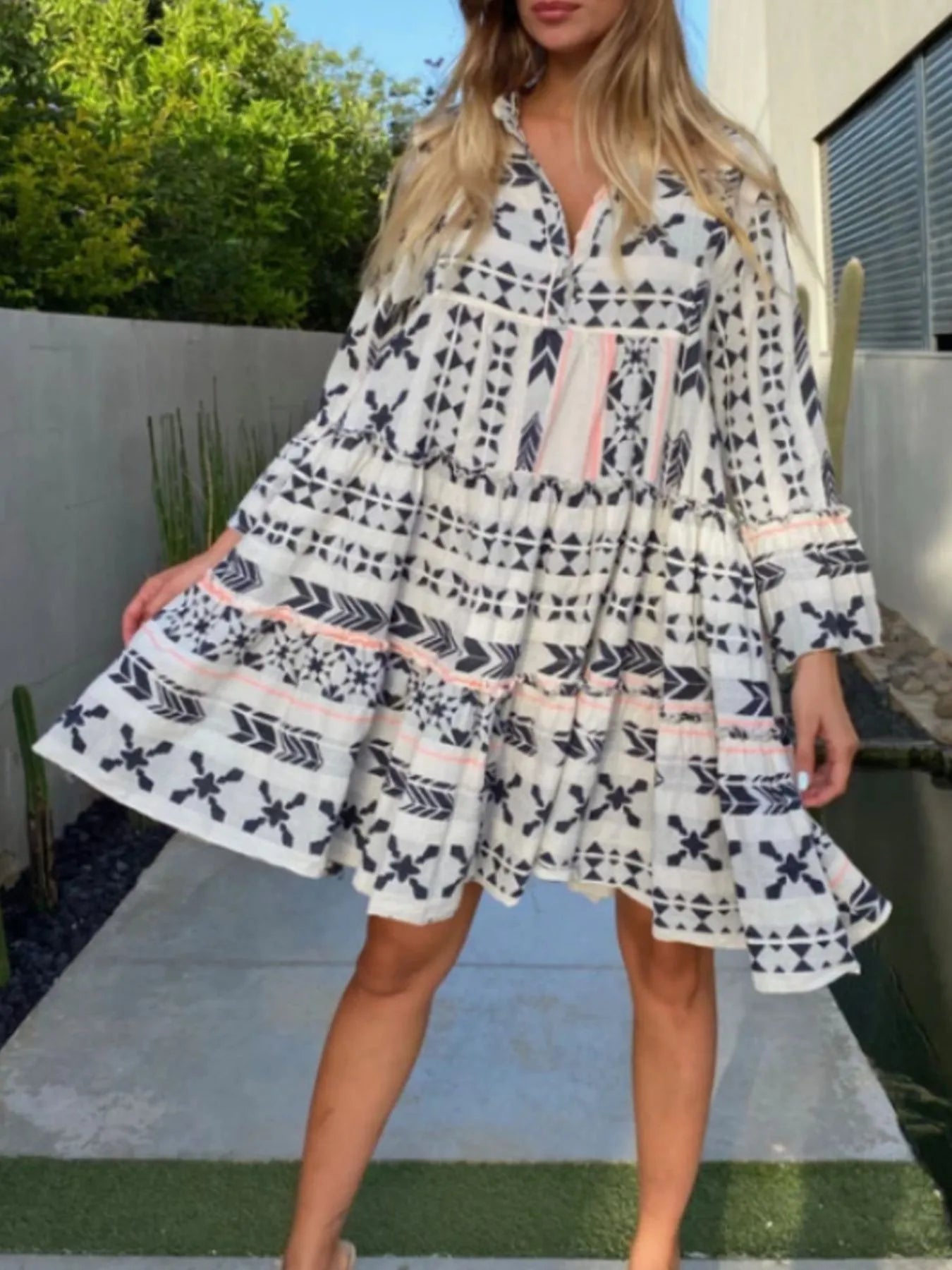 Printed Tiered Babydoll Dress.
