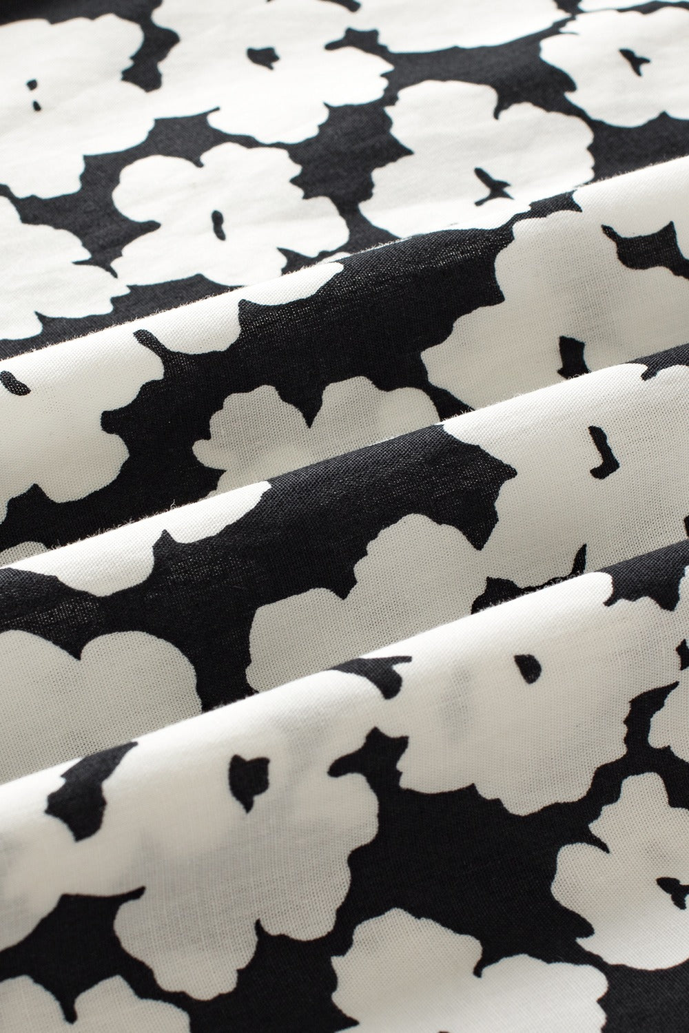 Printed V-Neck Flounce Sleeve Blouse.