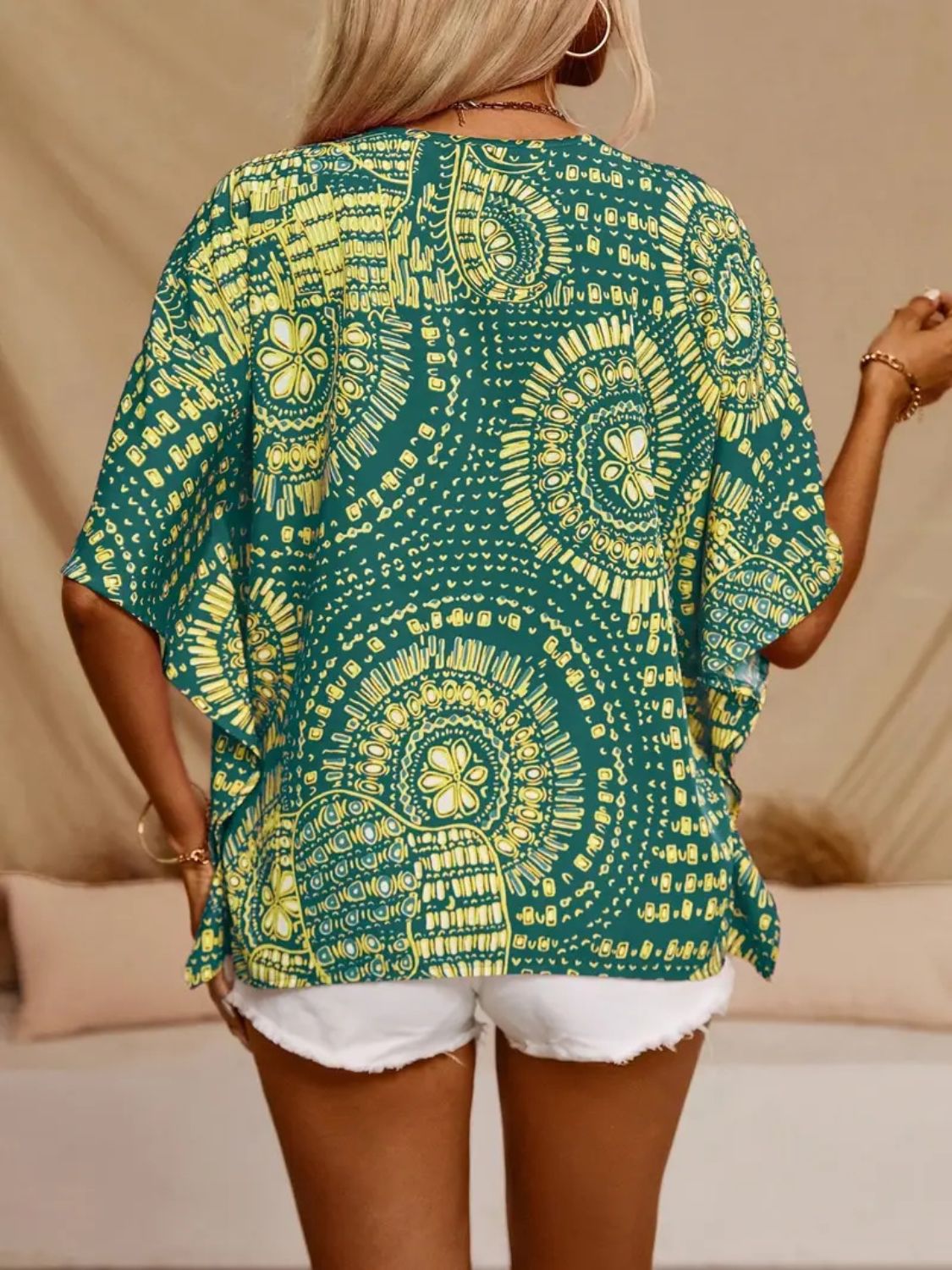 Printed V-Neck Half Sleeve Top.