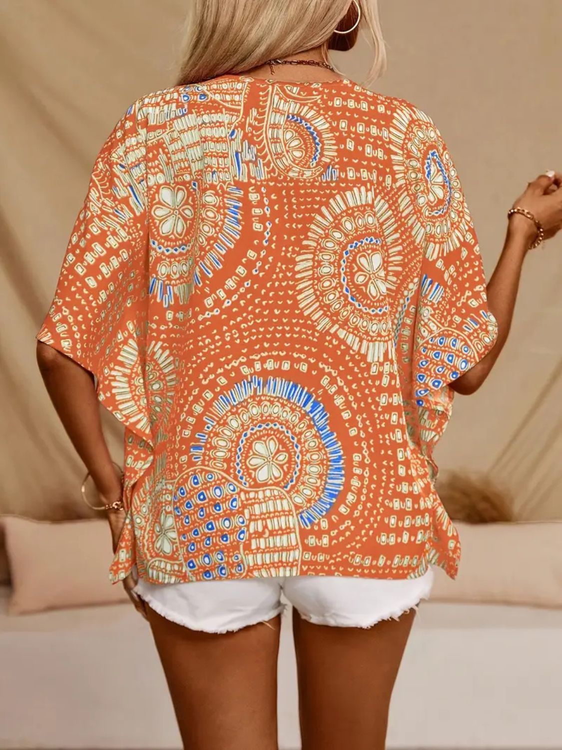 Printed V-Neck Half Sleeve Top.