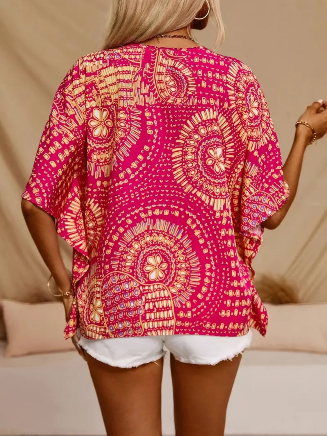 Printed V-Neck Half Sleeve Top.