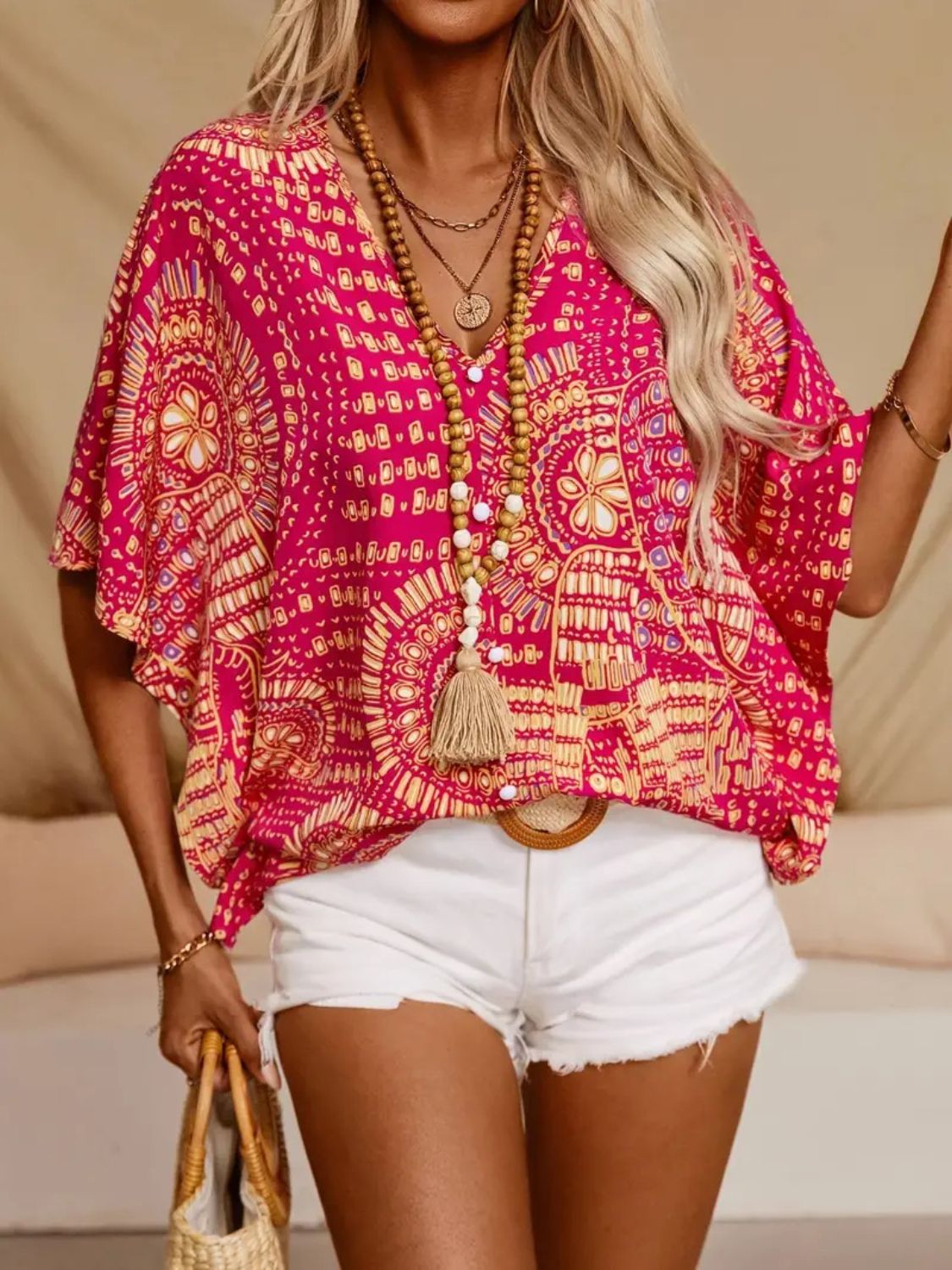 Printed V-Neck Half Sleeve Top.