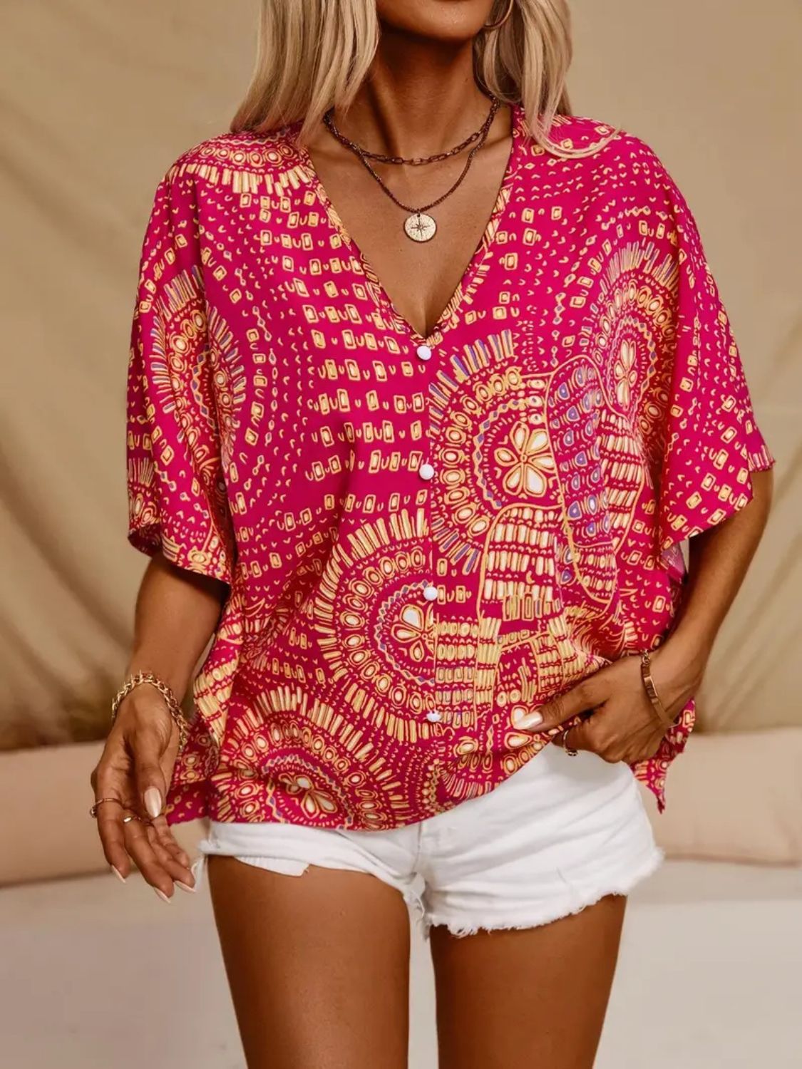 Printed V-Neck Half Sleeve Top.