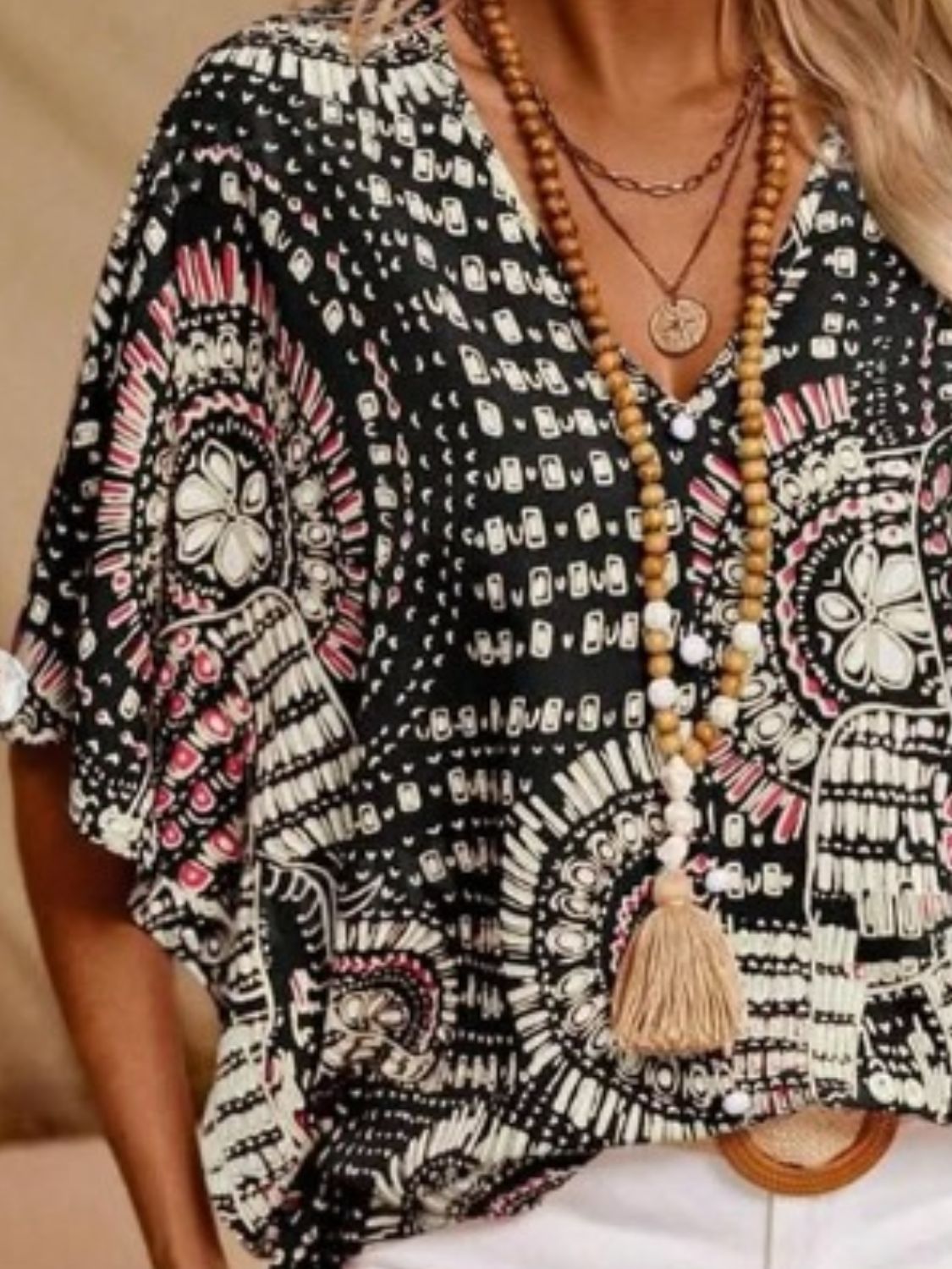 Printed V-Neck Half Sleeve Top.