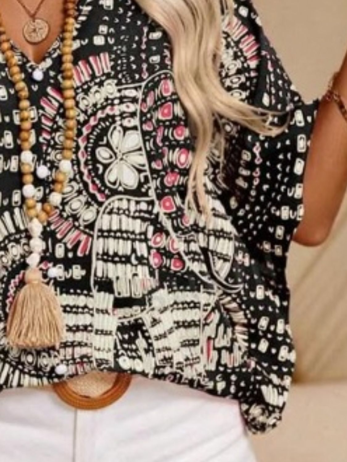 Printed V-Neck Half Sleeve Top.