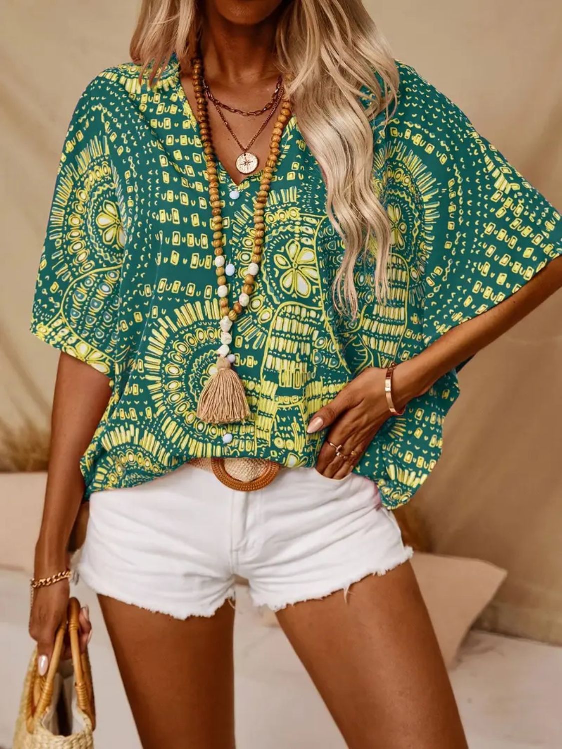 Printed V-Neck Half Sleeve Top.