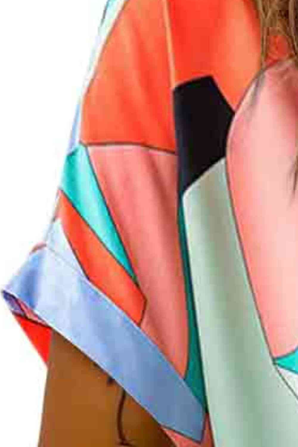 Printed V-Neck Short Sleeve Blouse.