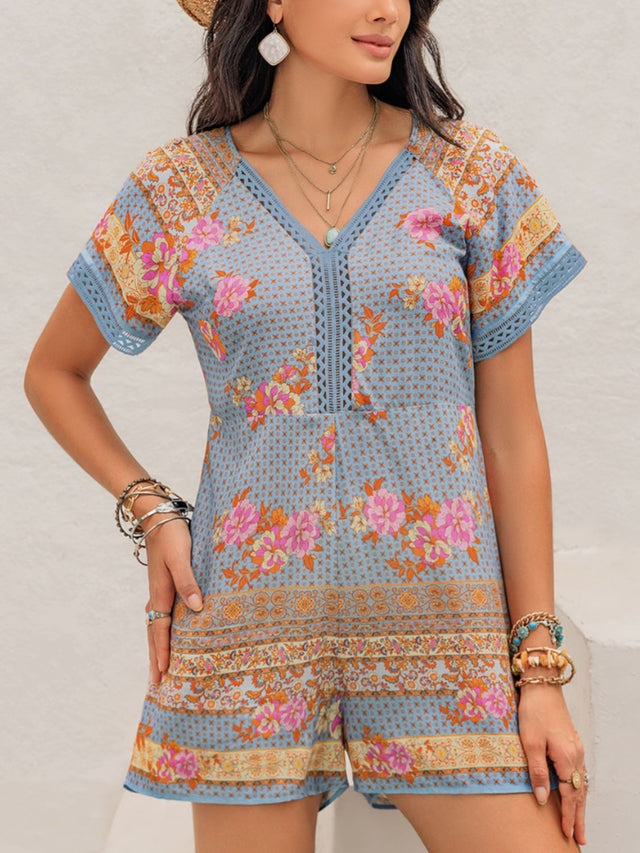 Printed V-Neck Short Sleeve Romper with Cutout.