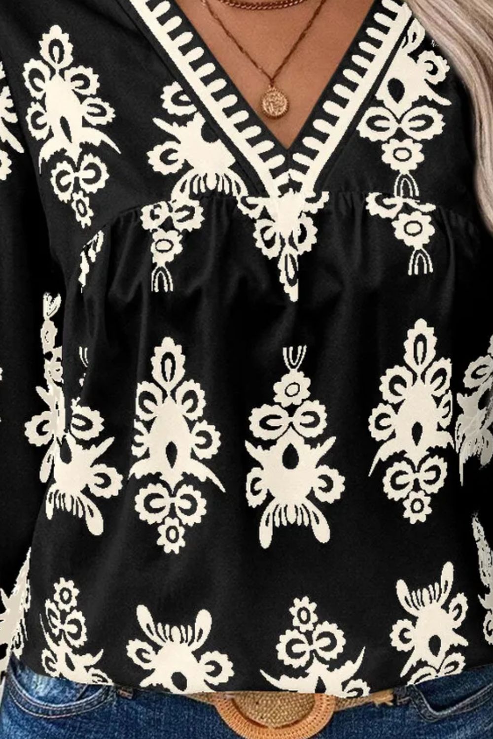 Printed V-Neck Three-Quarter Sleeve Blouse.