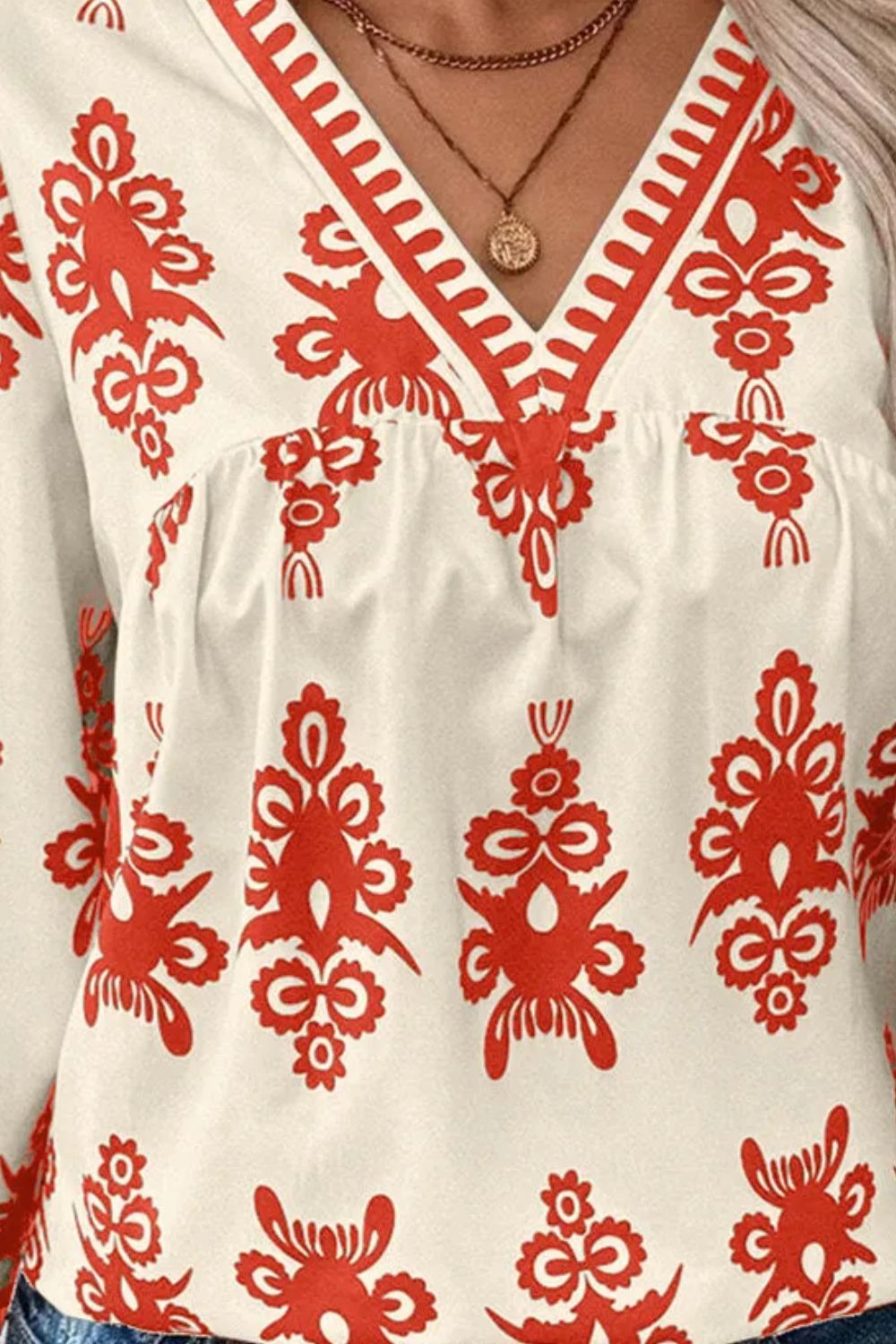 Printed V-Neck Three-Quarter Sleeve Blouse.