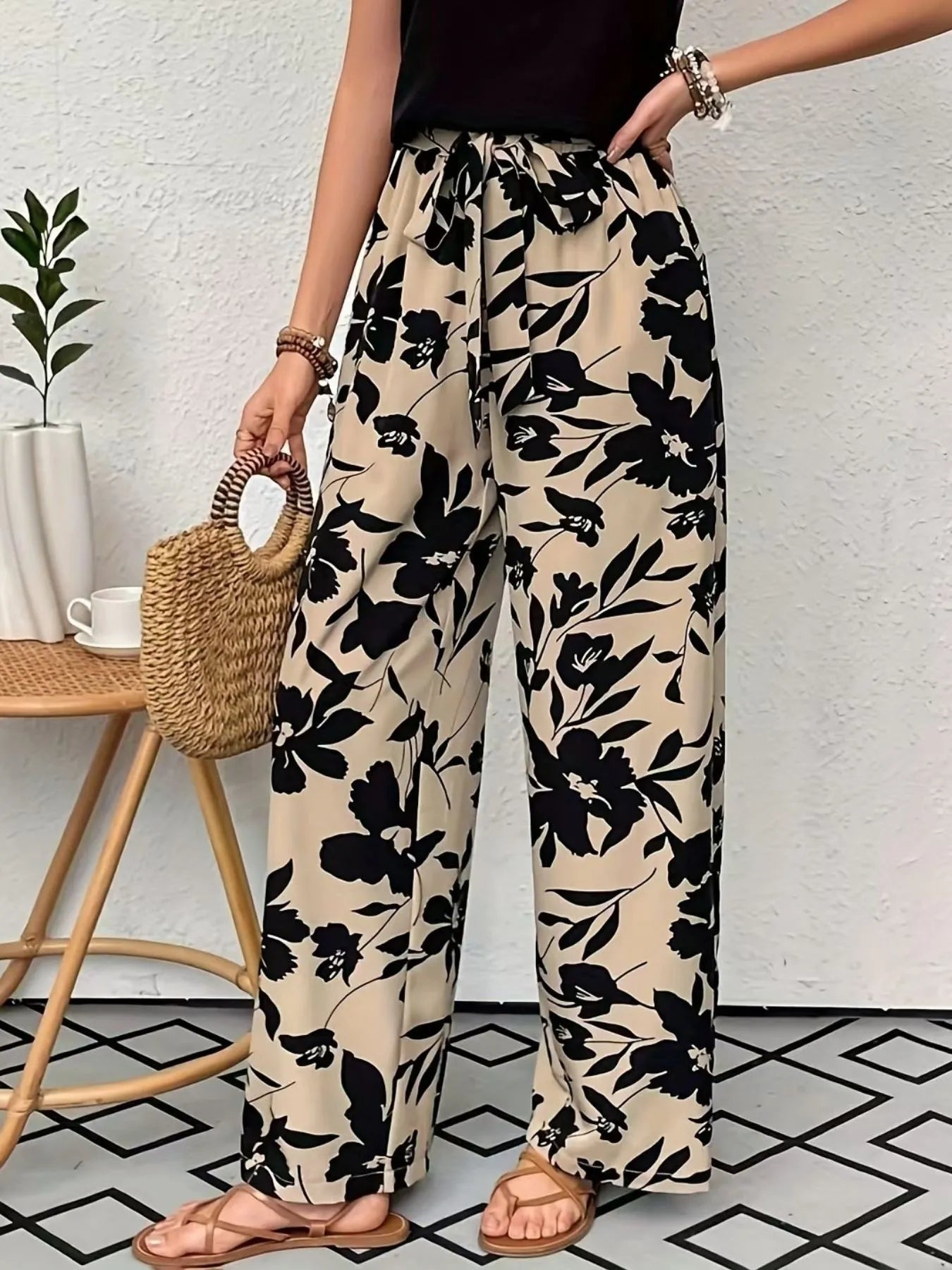 Printed wide leg casual pants with drawstring and pockets.