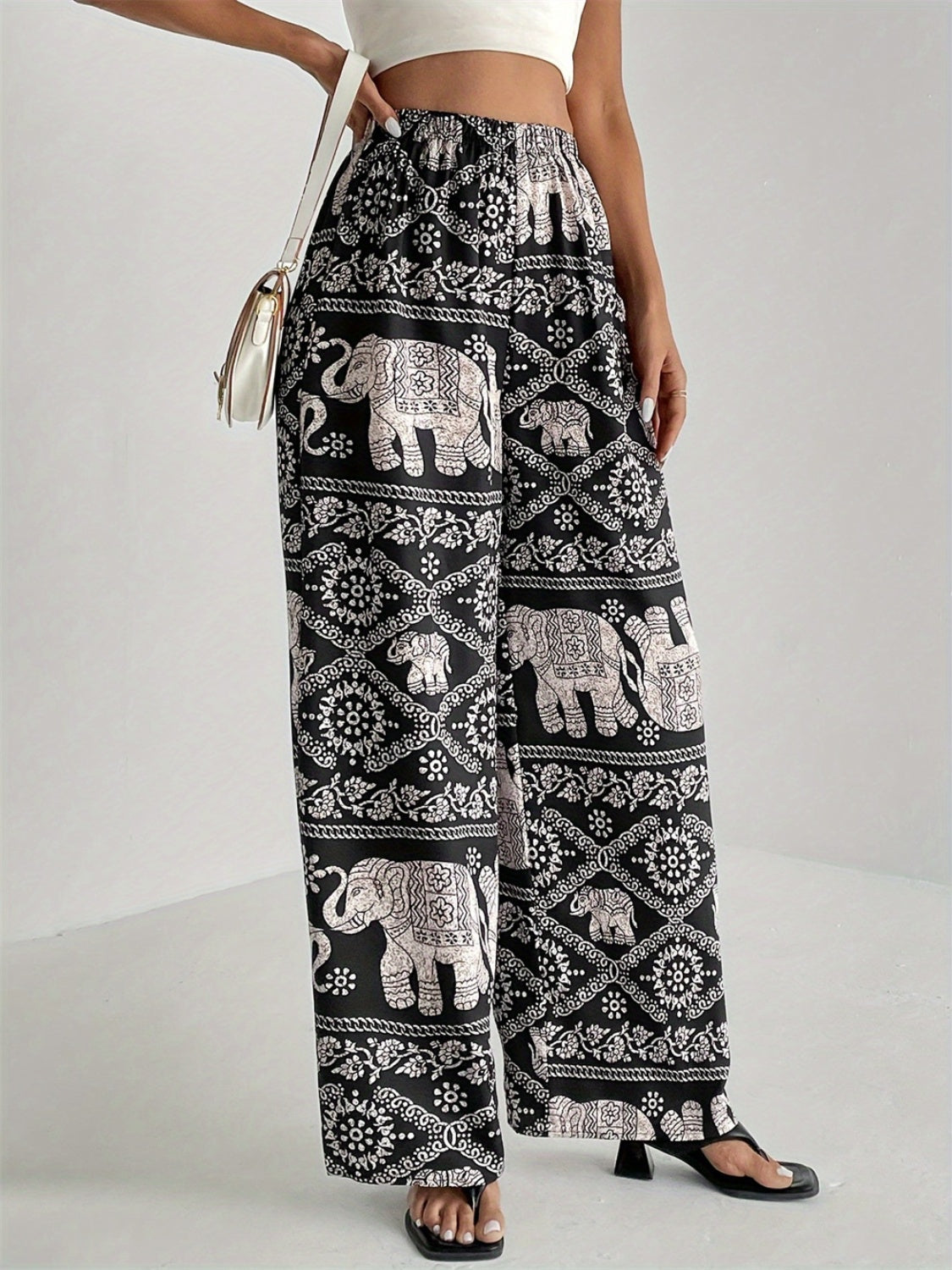 Printed wide leg elastic waist pants, opaque.